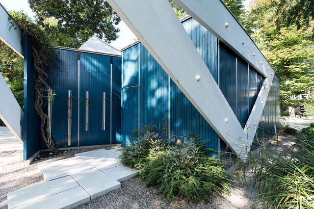 Blue and white Finland Pavilion designed by Alvar Aalto.