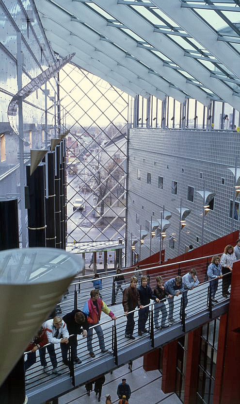 Teenagers on a bridge on the second floor.