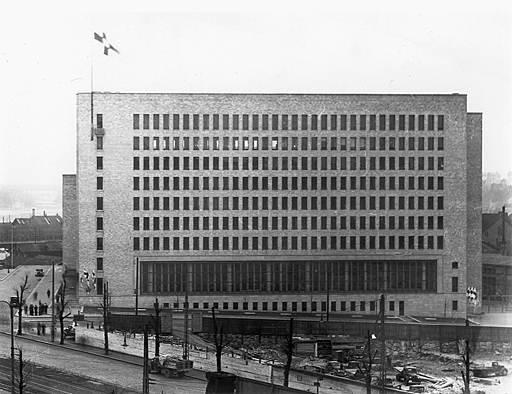 Façade of high-rise building filled with square windows