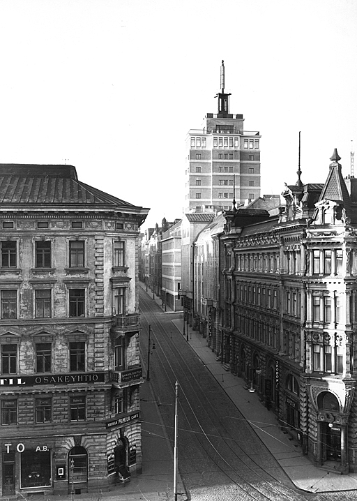 Tower of the hotel standing out from the surrounding lower buildings