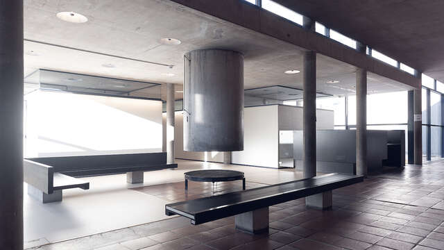 An indoor space with benches well lit from outside.