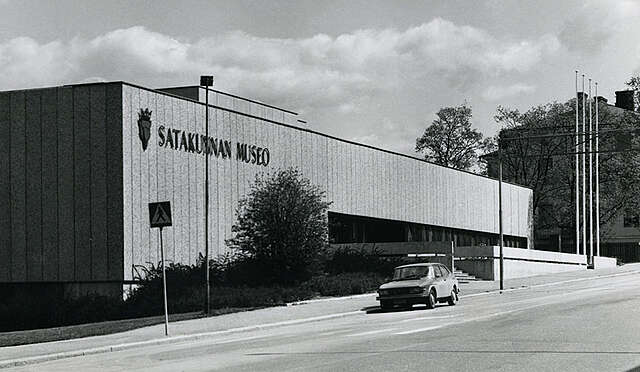 Facade of raw Brutalist-style concrete.