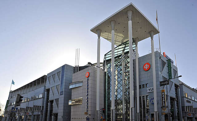 Facade with tile, glass and metal details.