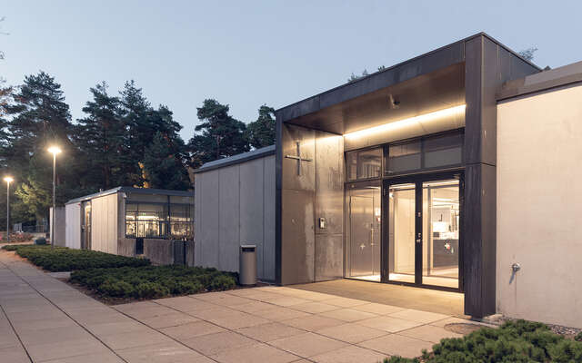 A paved entrance to a stone sturcture