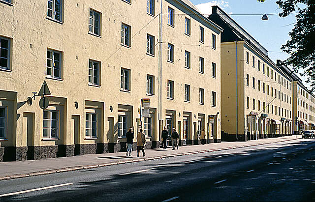 Streetview and a yellow painted apartment building