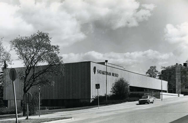 Facade of raw Brutalist-style concrete.