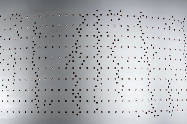 Detail of holes in the silo façade