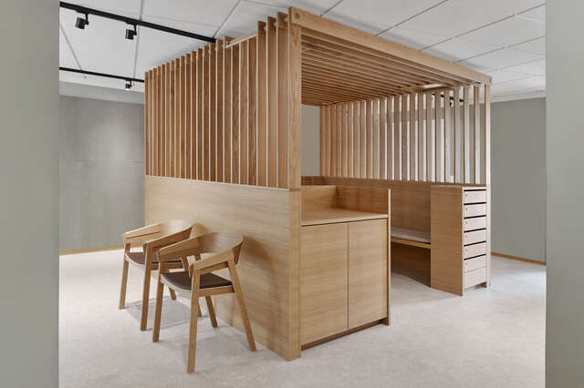 A wooden structure inside a room