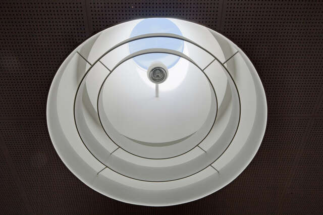 White circular ceiling window.