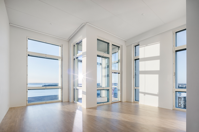 Apartment interior with windows facing out