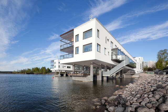 Two modern apartment buildings built on docks with direct access to the sea.
