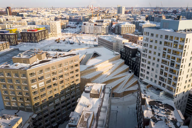 A large wooden structure covered in snow