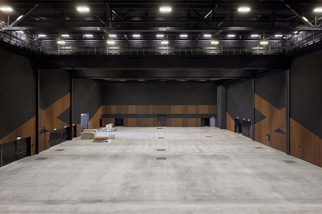 A large hall with a concrete floor