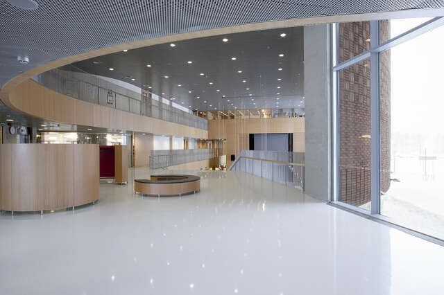 School hallway with wooden glass and metal elements.
