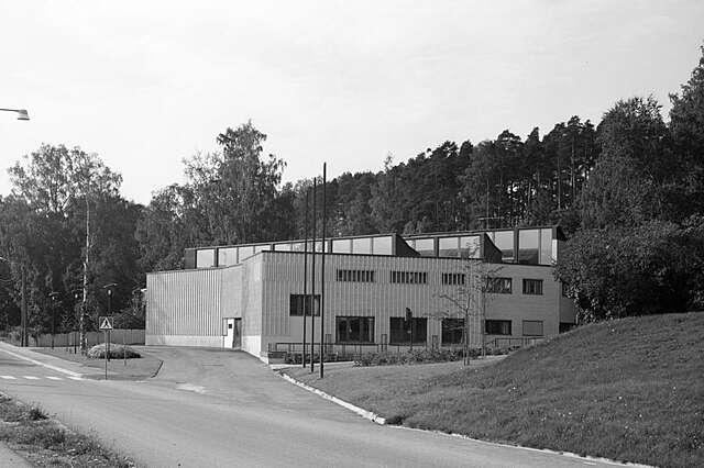 Three storey museum building with baton shaped glazed tiles.