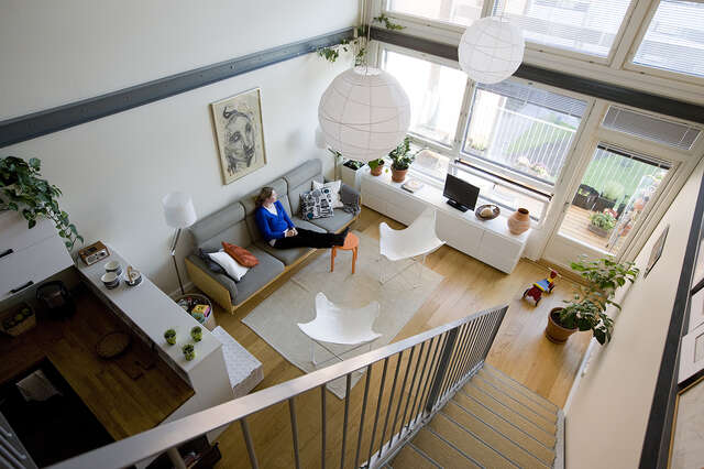 Comfortable living room viewed from above the stairs.