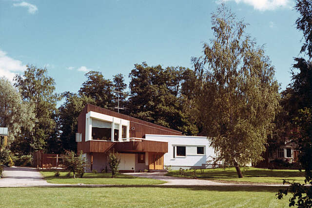 Old picture of the white and wooden facade