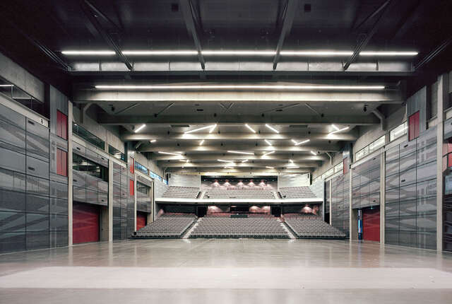 Auditorium in two levels at the end of an industrial interior