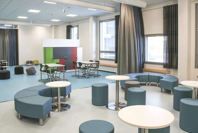 Large room with different sitting options.