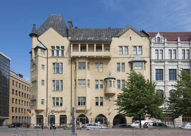 A square, a building and trees