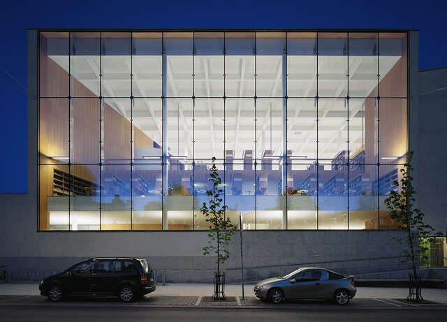 Large glass wall next to the street.