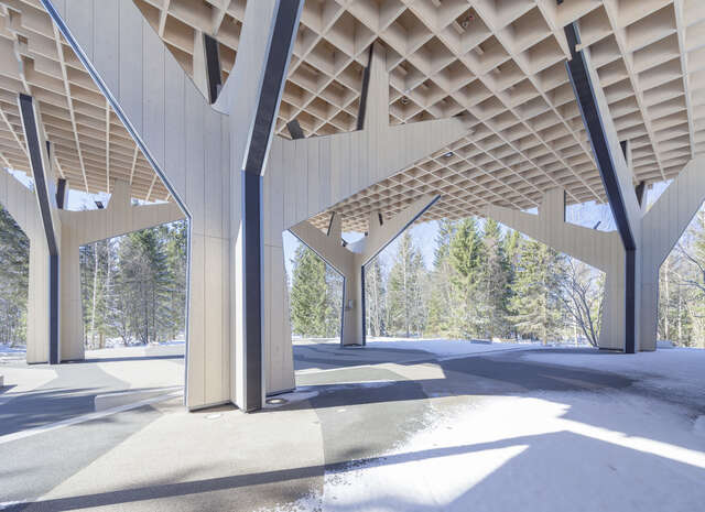 Under a wooden canopy