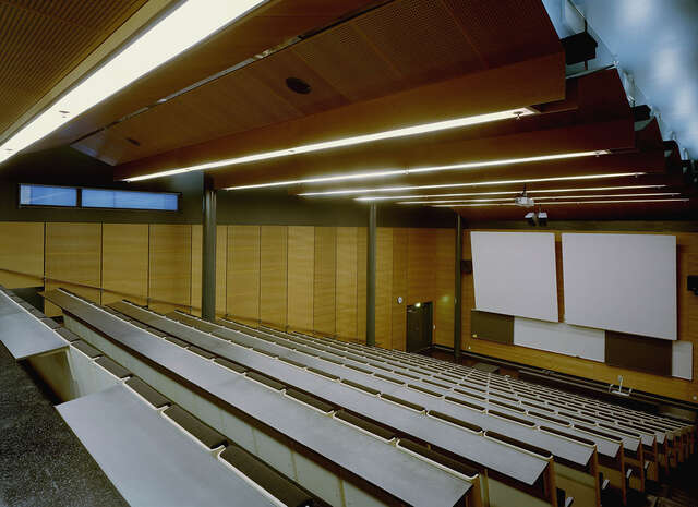 Auditorium with wood surfaces.