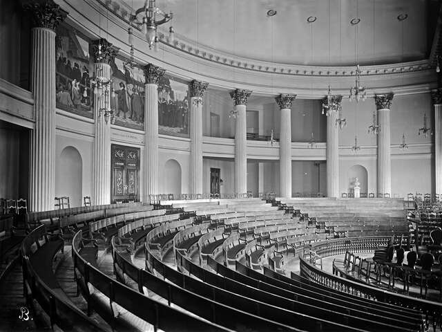 Old black and white picture of the ornate assembly hall.