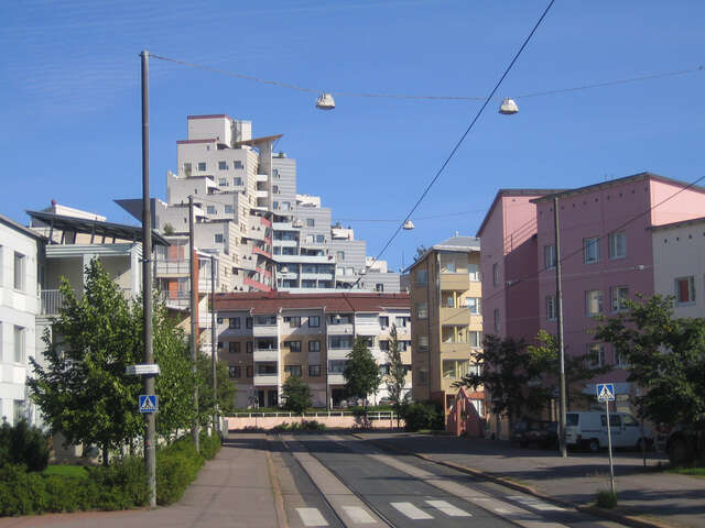Terraced building in the background in the middle of the colorful residential area