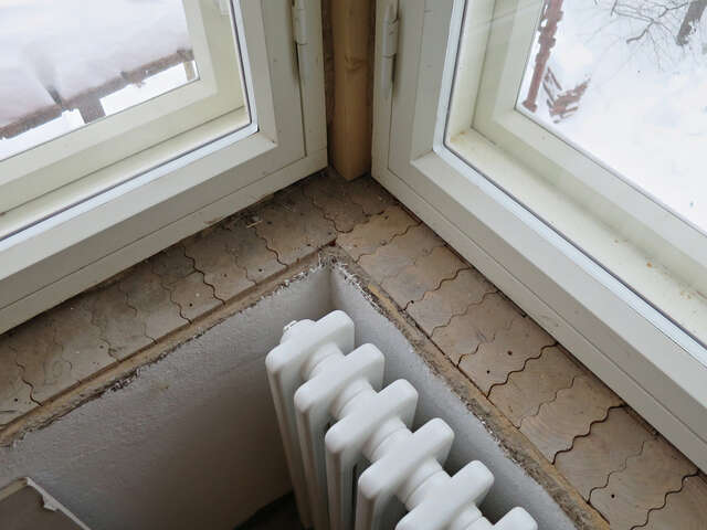 Building's timber walls seen from inside the building.