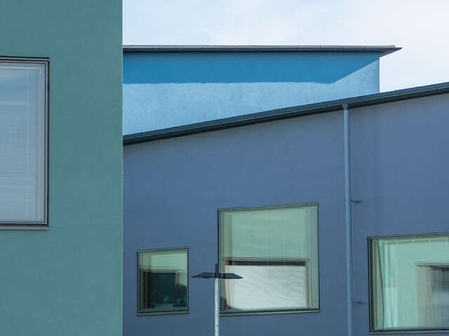 Close up shot of the different blue shades used on the school exterior.