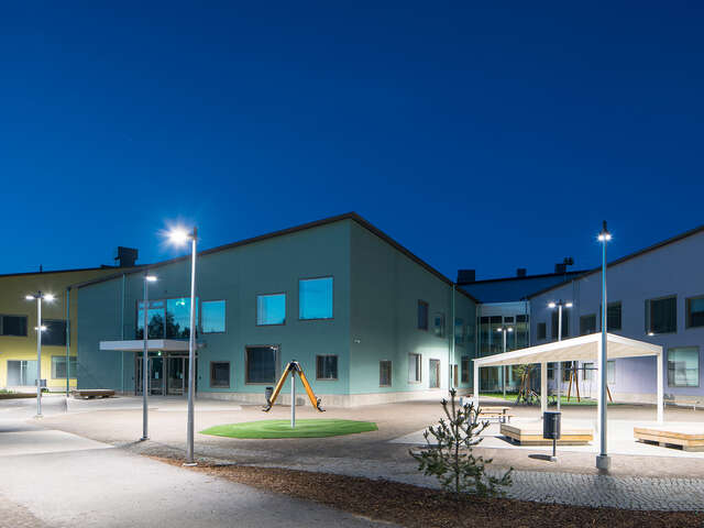School yard photographed during the evening.