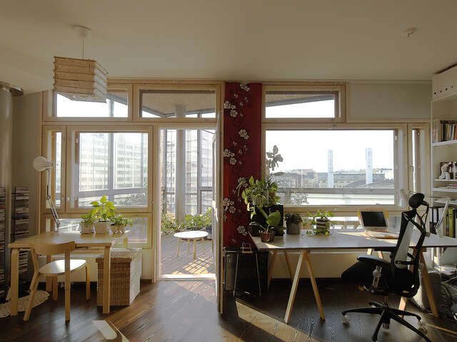 Living room with a view of the Kamppi shopping centre.
