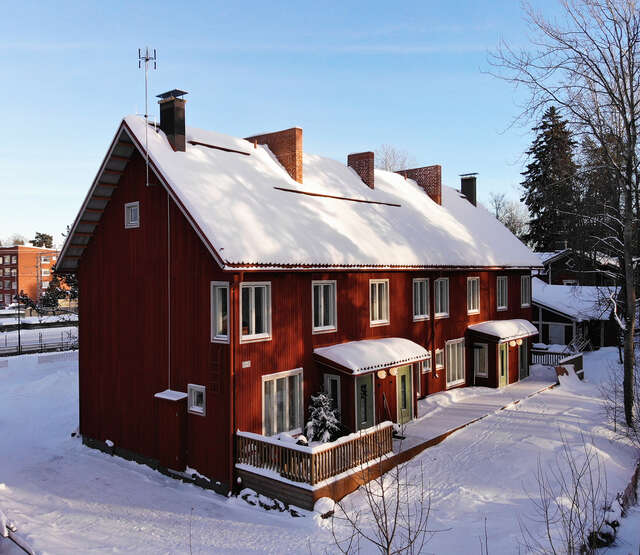 A wooden terraced house.