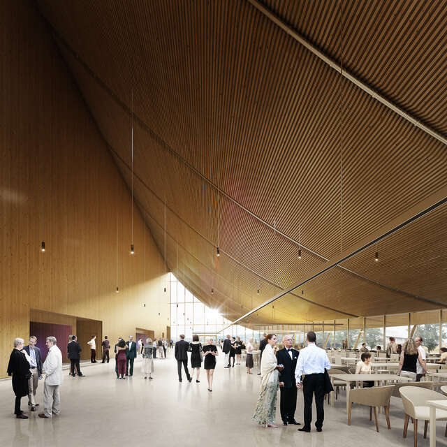 Lobby of the building with people in the foreground.