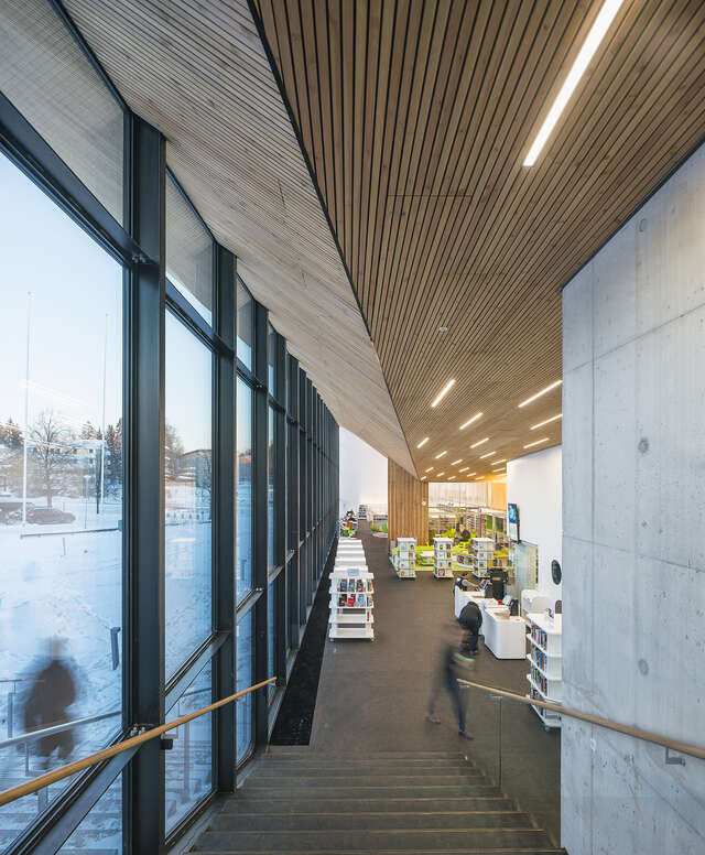 Staircase with the shelves in the back.