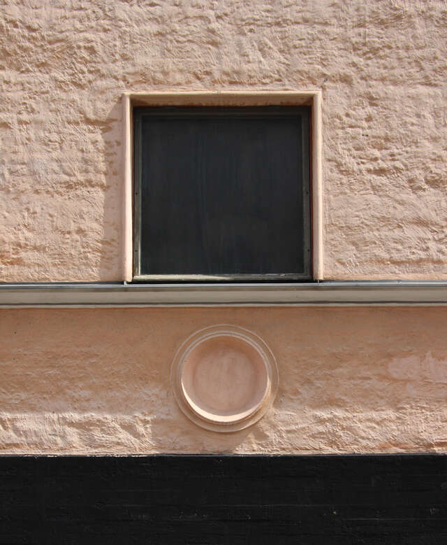 Round medallion on the wall.