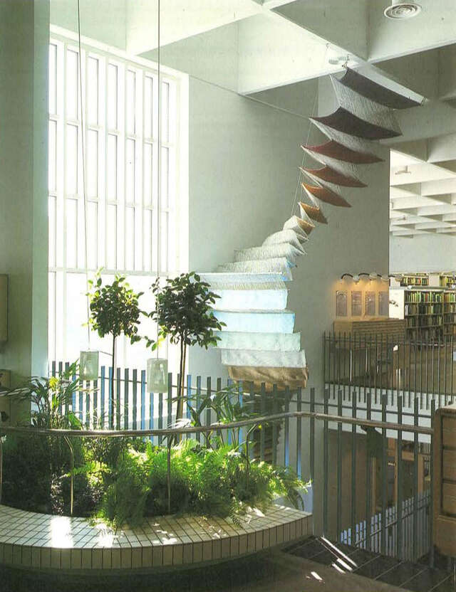 Two-storey high entrance lobby and textile art piece.