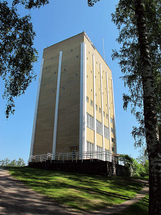 Water tower viewed diagonally from a downhill angle.
