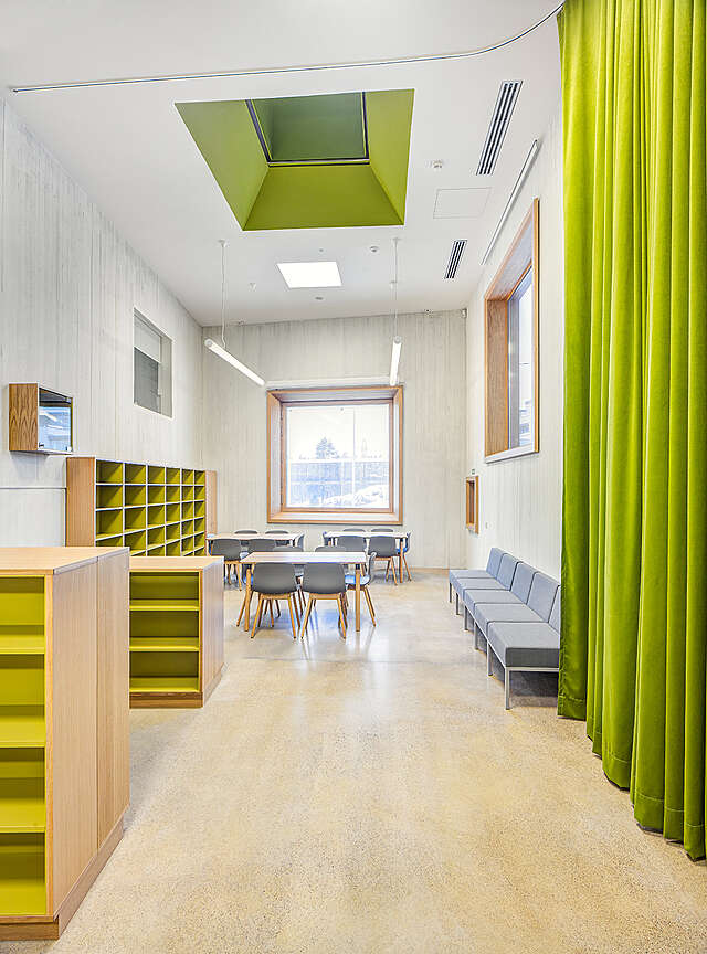 Bare room with green details.