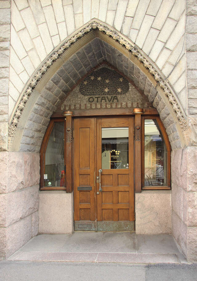 Stone entrance with the otava sign above the door.