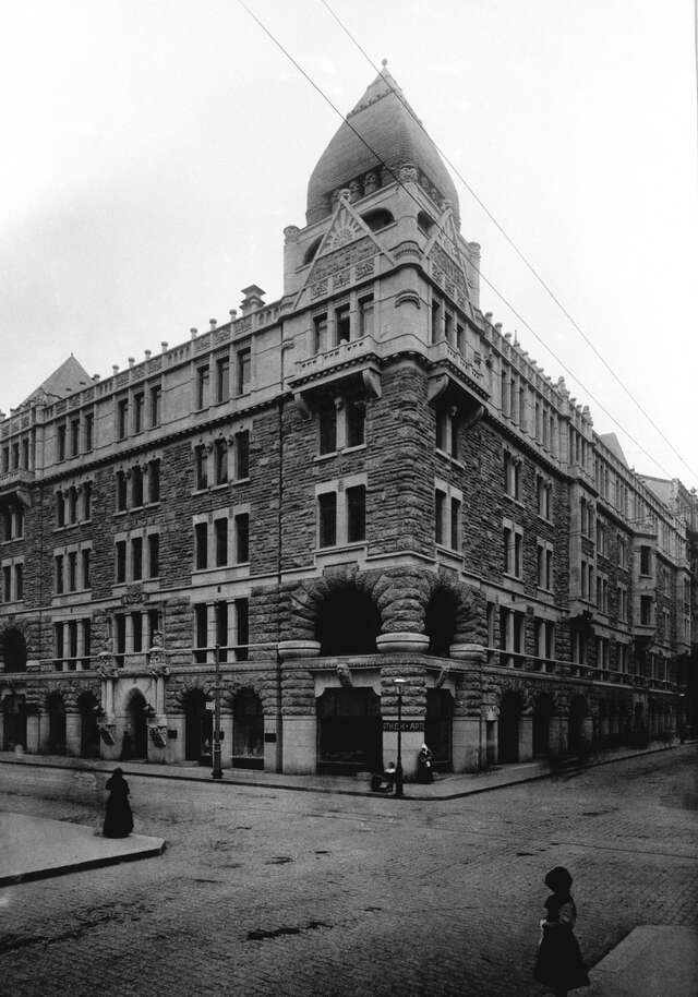 Corner of the street and the building.