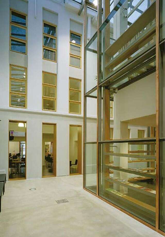 Gallery space between the original library and extension