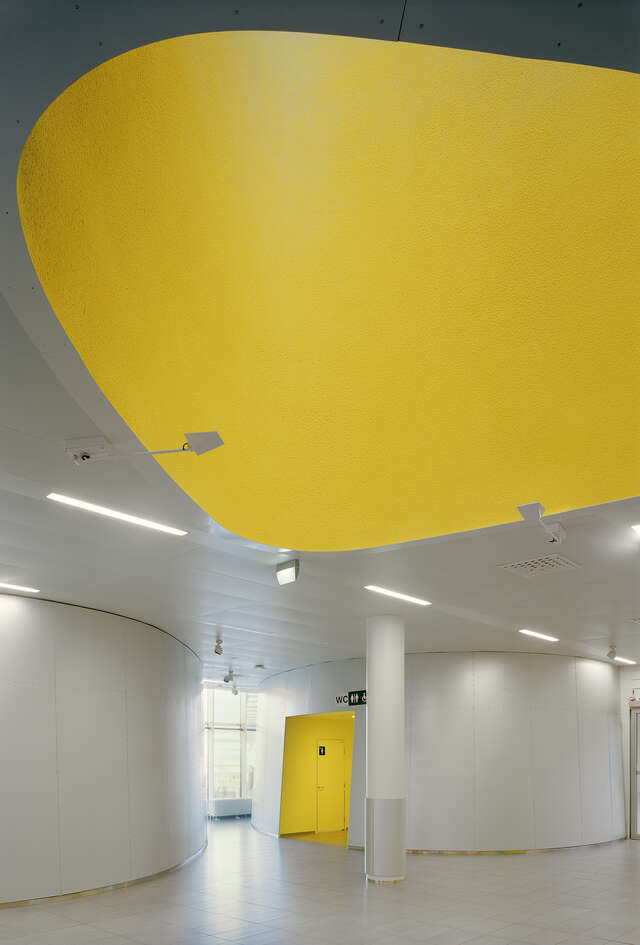 White interior with bright yellow details