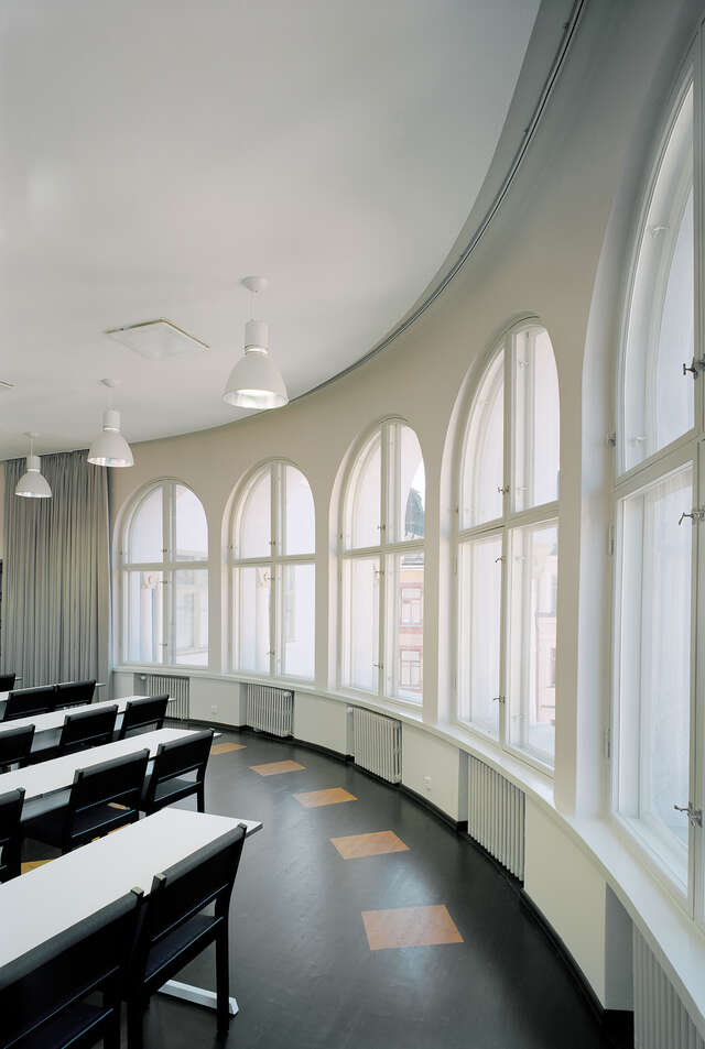 Curved arch window row and working area
