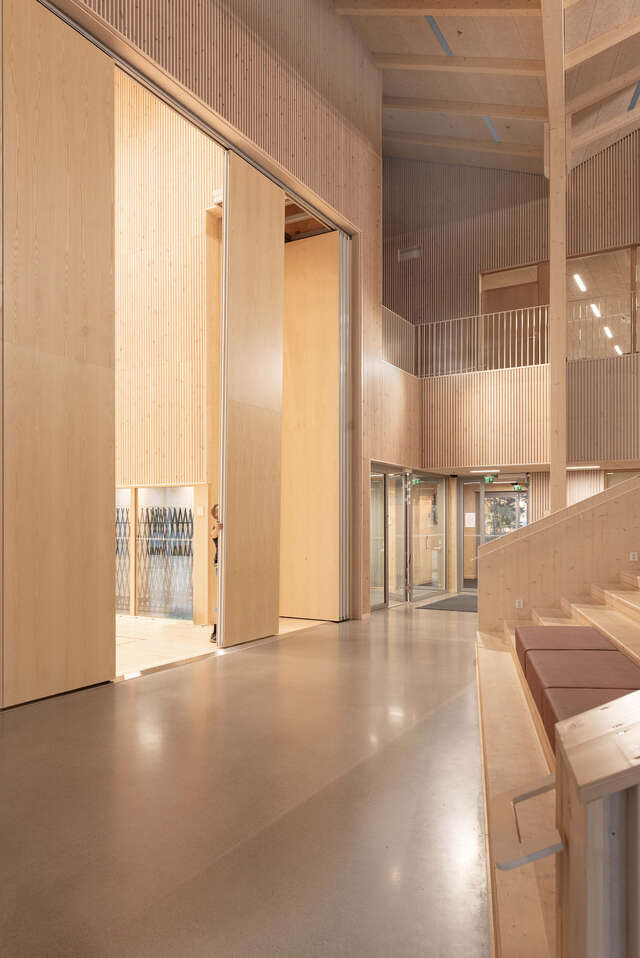 A large indoor space of a wooden building