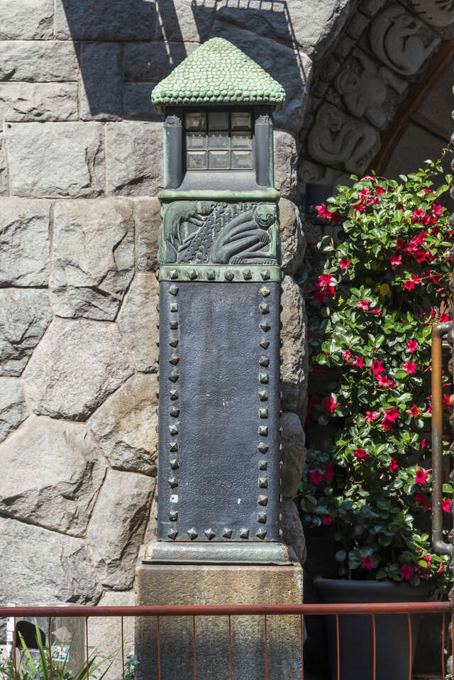 Metallic lantern with animal details.