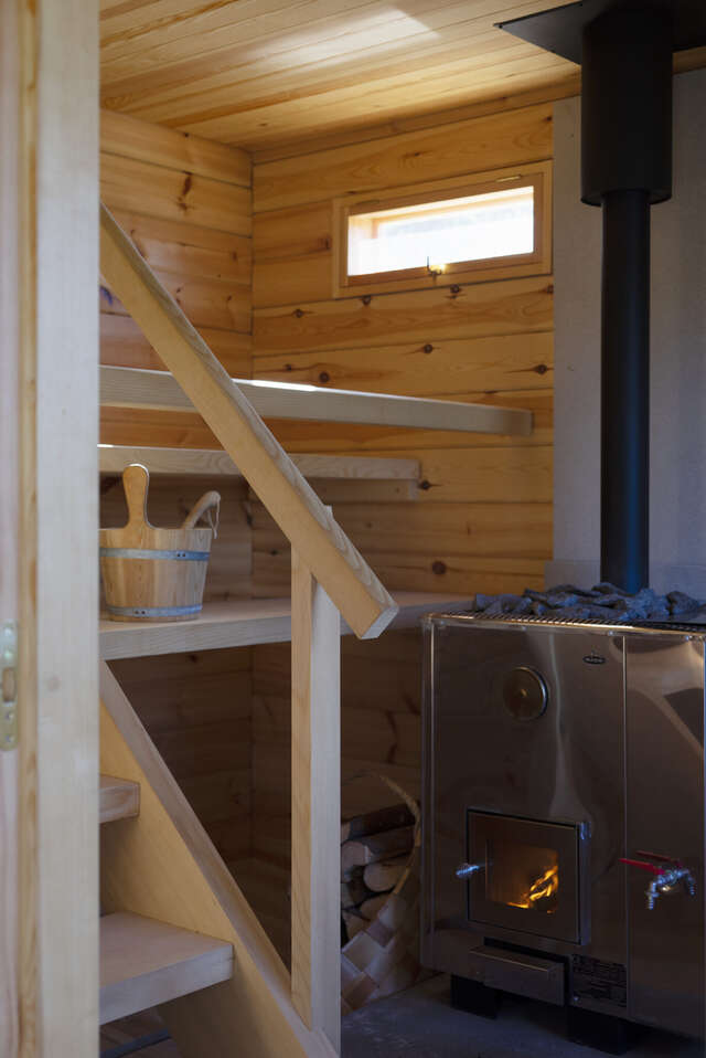 Interior of a small wooden sauna.