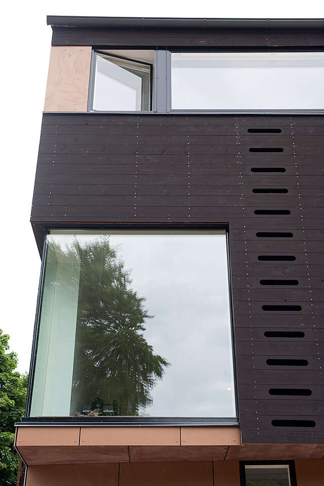 Building exterior with wind and tile elements.