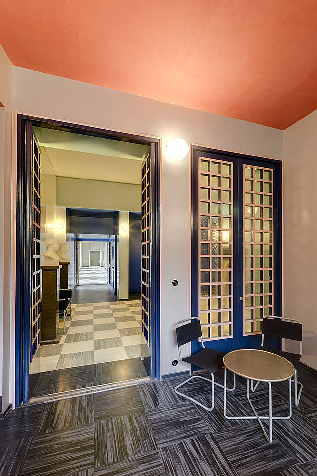 Small sitting area in the corner of a room.